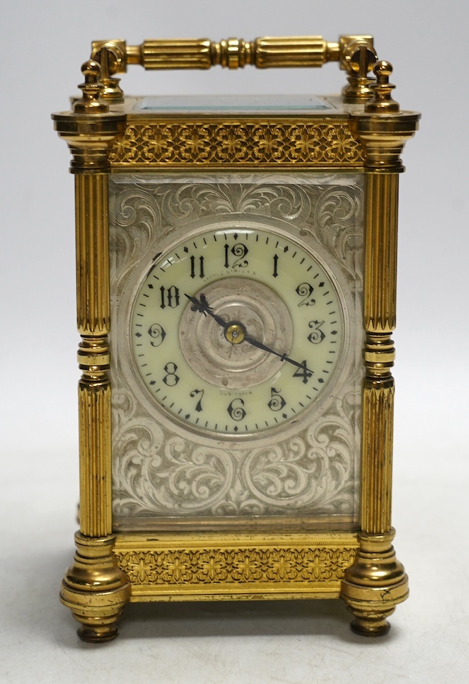 A late 19th French pierced brass cased eight day carriage timepiece, with key, 17cm. Condition - side panel cracked, not tested as working